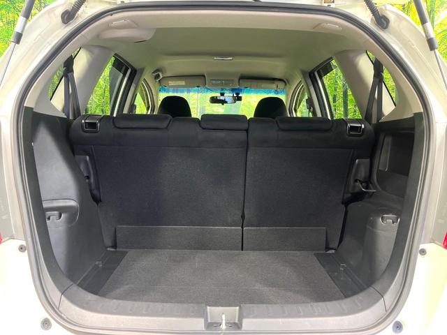 フィット １３Ｇ・スマートセレクション　ファインスタイル　純正ナビ　バックカメラ　スマートキー　ＨＩＤヘッドライト　ビルトインＥＴＣ　ドライブレコーダー　１４インチアルミホイール　オートライト　オートエアコン　ＣＤ　ＴＶ　電動格納ミラー　禁煙（42枚目）