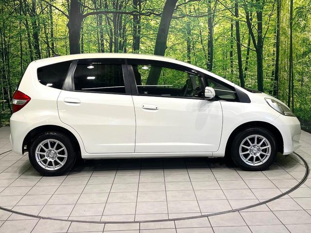 フィット １３Ｇ・スマートセレクション　ファインスタイル　純正ナビ　バックカメラ　スマートキー　ＨＩＤヘッドライト　ビルトインＥＴＣ　ドライブレコーダー　１４インチアルミホイール　オートライト　オートエアコン　ＣＤ　ＴＶ　電動格納ミラー　禁煙（57枚目）