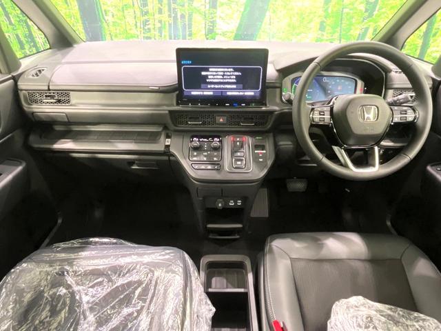 ステップワゴン ｅ：ＨＥＶスパーダ　登録済未使用車　純正１１．４型ナビ　バックカメラ　両側電動スライドドア　ホンダセンシング　パワーバックドア　ブラインドスポットモニター　前席シートヒーター　電動パーキングブレーキ（2枚目）