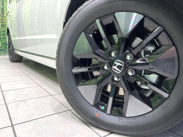 ステップワゴン ｅ：ＨＥＶスパーダ　登録済未使用車　純正１１．４型ナビ　バックカメラ　両側電動スライドドア　ホンダセンシング　パワーバックドア　ブラインドスポットモニター　前席シートヒーター　電動パーキングブレーキ（14枚目）