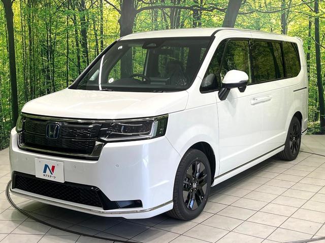 ステップワゴン ｅ：ＨＥＶスパーダ　登録済未使用車　純正１１．４型ナビ　バックカメラ　両側電動スライドドア　ホンダセンシング　パワーバックドア　ブラインドスポットモニター　前席シートヒーター　電動パーキングブレーキ（58枚目）