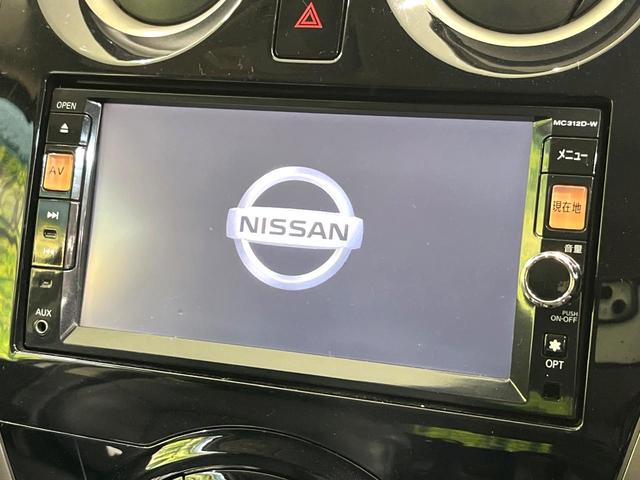ノート メダリスト　純正ナビ　アラウンドビューモニター　ＨＩＤヘッドランプ　スマートキー　オートエアコン　オートライト　フォグランプ　ＥＴＣ　アームレスト　電動格納ミラー　アイドリングストップ　禁煙車（3枚目）