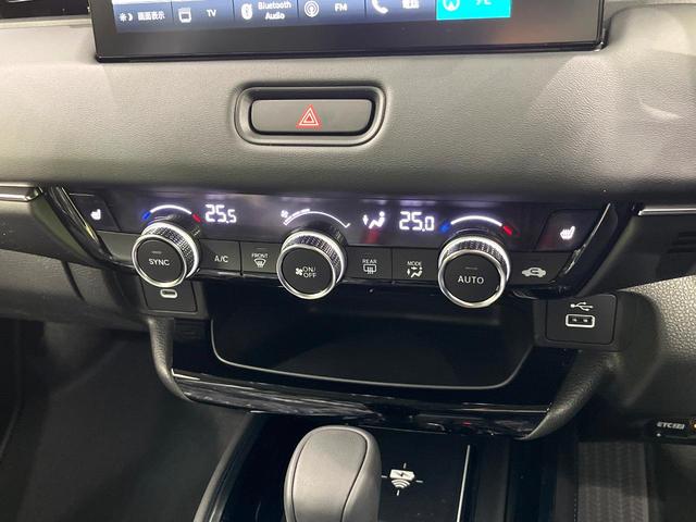 ヴェゼル ｅ：ＨＥＶ　Ｚ　登録済未使用車　ホンダセンシング　純正９型ナビ　マルチビューカメラシステム　ブラインドスポットモニター　パワーバックドア　前席シートヒーター　ハンドルヒーター　電動パーキングブレーキ（32枚目）