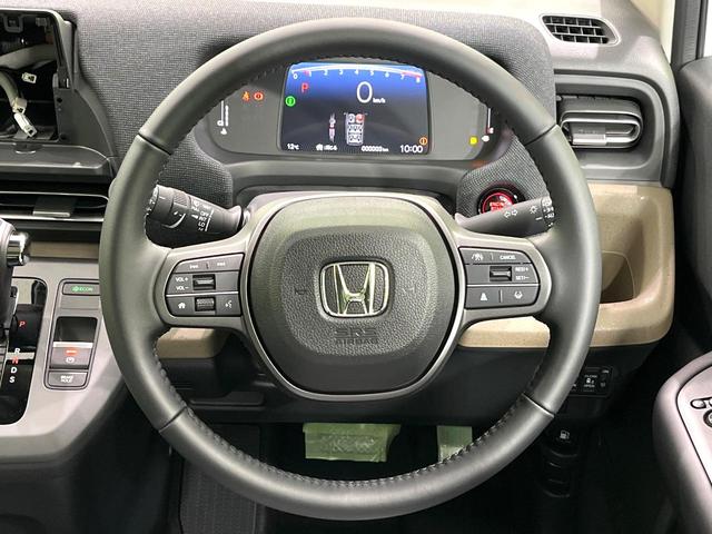 フリード エアー　ＥＸ　登録済未使用車　ホンダセンシング　ブラインドスポットモニター　両側電動スライドドア　アダプティブクルーズコントロール　前席シートヒーター　ＬＥＤヘッドランプ　ハーフレザーシート　純正１５インチアルミ（12枚目）