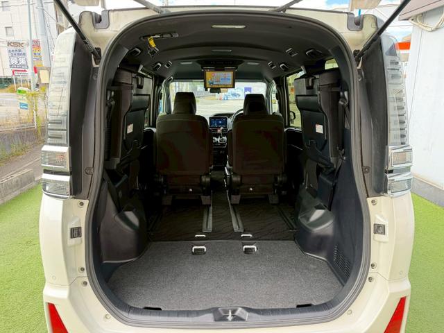 ヴォクシー ＺＳ　煌ＩＩ　衝突軽減／両側パワスラ／純正ナビ／バックカメラ　衝突軽減ブレーキ／両側パワースライドドア／純正ナビ／バックカメラ／スマートキー／クルーズコントロール／純正１６インチアルミ／後席モニター／ＥＴＣ／地デジ／ＬＥＤヘッドライト／フォグランプ／ラプター塗装（51枚目）