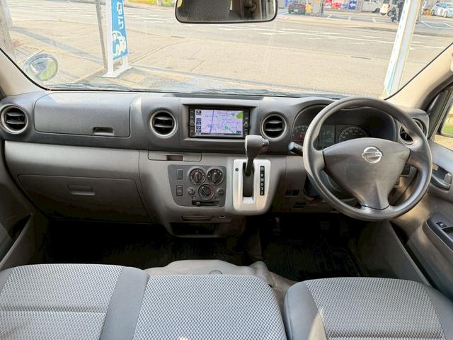 NV350キャラバンバン ロングDX 衝突軽減ブレーキ/9人乗り/ナビ/バックカメラ 衝突軽減ブレーキ/9人乗り/純正ナビ/バックカメラ/パワーウィンドウ/キーレス/地デジ/ETC/3列シート/スライドドア/ヘッドライトレベライザー/Bluetooth搭載/横滑り防止装置/フルフラット(7枚目)