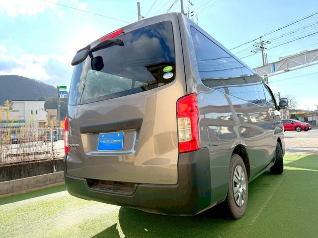 NV350キャラバンバン ロングDX 衝突軽減ブレーキ/9人乗り/ナビ/バックカメラ 衝突軽減ブレーキ/9人乗り/純正ナビ/バックカメラ/パワーウィンドウ/キーレス/地デジ/ETC/3列シート/スライドドア/ヘッドライトレベライザー/Bluetooth搭載/横滑り防止装置/フルフラット(26枚目)