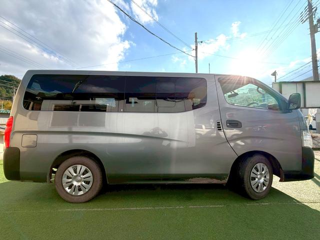 NV350キャラバンバン ロングDX 衝突軽減ブレーキ/9人乗り/ナビ/バックカメラ 衝突軽減ブレーキ/9人乗り/純正ナビ/バックカメラ/パワーウィンドウ/キーレス/地デジ/ETC/3列シート/スライドドア/ヘッドライトレベライザー/Bluetooth搭載/横滑り防止装置/フルフラット(27枚目)