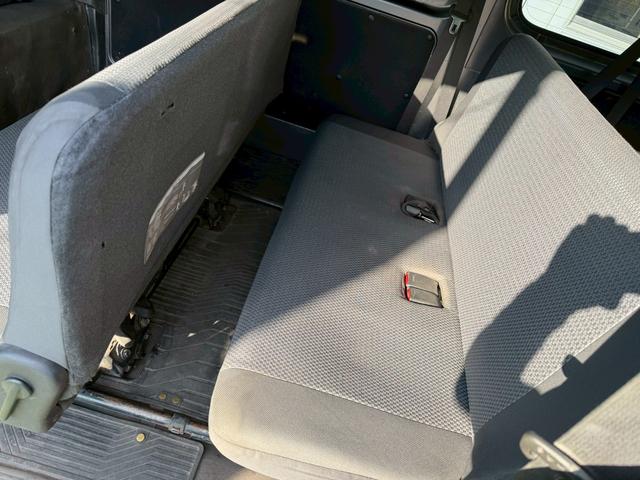 NV350キャラバンバン ロングDX 衝突軽減ブレーキ/9人乗り/ナビ/バックカメラ 衝突軽減ブレーキ/9人乗り/純正ナビ/バックカメラ/パワーウィンドウ/キーレス/地デジ/ETC/3列シート/スライドドア/ヘッドライトレベライザー/Bluetooth搭載/横滑り防止装置/フルフラット(50枚目)