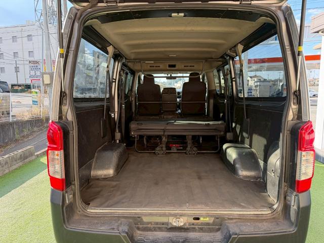 NV350キャラバンバン ロングDX 衝突軽減ブレーキ/9人乗り/ナビ/バックカメラ 衝突軽減ブレーキ/9人乗り/純正ナビ/バックカメラ/パワーウィンドウ/キーレス/地デジ/ETC/3列シート/スライドドア/ヘッドライトレベライザー/Bluetooth搭載/横滑り防止装置/フルフラット(52枚目)