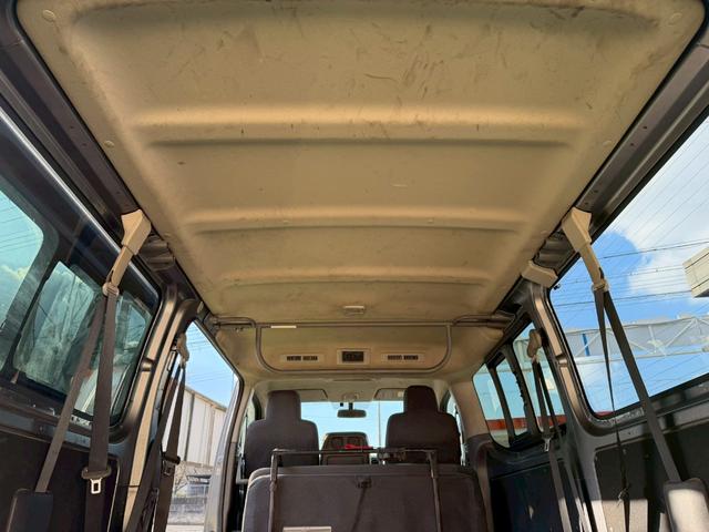 NV350キャラバンバン ロングDX 衝突軽減ブレーキ/9人乗り/ナビ/バックカメラ 衝突軽減ブレーキ/9人乗り/純正ナビ/バックカメラ/パワーウィンドウ/キーレス/地デジ/ETC/3列シート/スライドドア/ヘッドライトレベライザー/Bluetooth搭載/横滑り防止装置/フルフラット(54枚目)