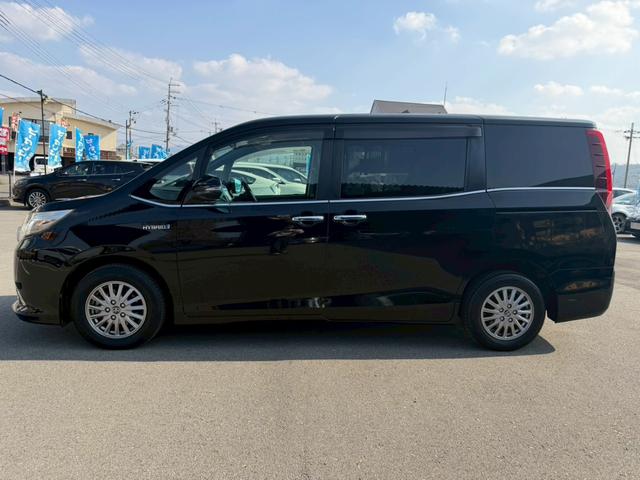 エスクァイア ハイブリッドＧｉ　車両品質評価書付き　ディーラーオプション９インチナビ　クルーズコントロール　バックカメラ　オートライト　シートヒーター　ＥＴＣ　テレビ機能　両側パワースライドドア　ステアリングリモコン　テレビキット（14枚目）