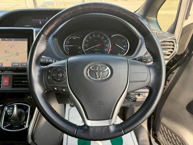 エスクァイア ハイブリッドＧｉ　車両品質評価書付き　ディーラーオプション９インチナビ　クルーズコントロール　バックカメラ　オートライト　シートヒーター　ＥＴＣ　テレビ機能　両側パワースライドドア　ステアリングリモコン　テレビキット（26枚目）