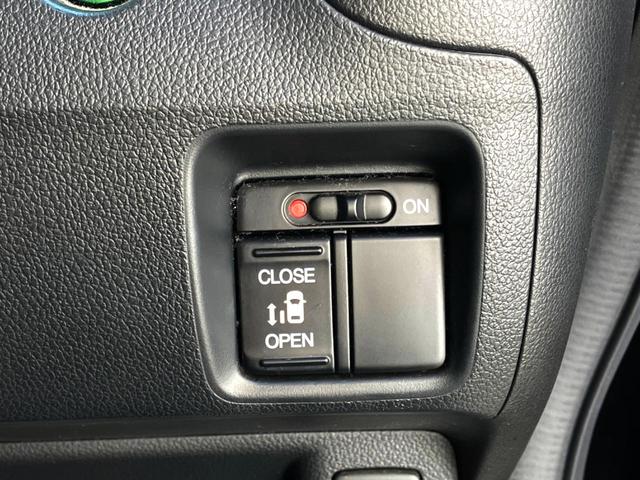 N-BOXカスタム G・Lパッケージ 電動スライドドア 純正SDナビ バックカメラ 禁煙車 HIDヘッド ETC オートエアコン 純正14インチアルミ CD DVD再生 地デジ(5枚目)