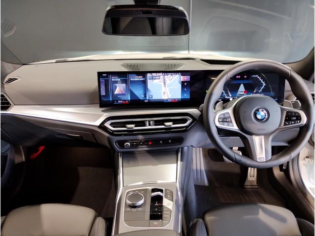 ３シリーズ ３２０ｉ　Ｍスポーツ　後期モデル　ハーフレザー　シートヒーター　ヘッドアップディスプレイ　カーブドディスプレイ　全周囲カメラ　障害物センサー　純正１８ＡＷ　追従式クルコン　パドルシフト　電動リアゲート　電動シート　ＬＥＤ（12枚目）