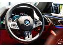 M850i xDriveクーペ 後期LCIモデル ボディカラー:スカイスクレイパーグレー Mカーボンファイバートリム Mパフォーマンスペダルセット フィオナレッド&ブラックレザー BMWレーザーヘッドライト(25枚目)