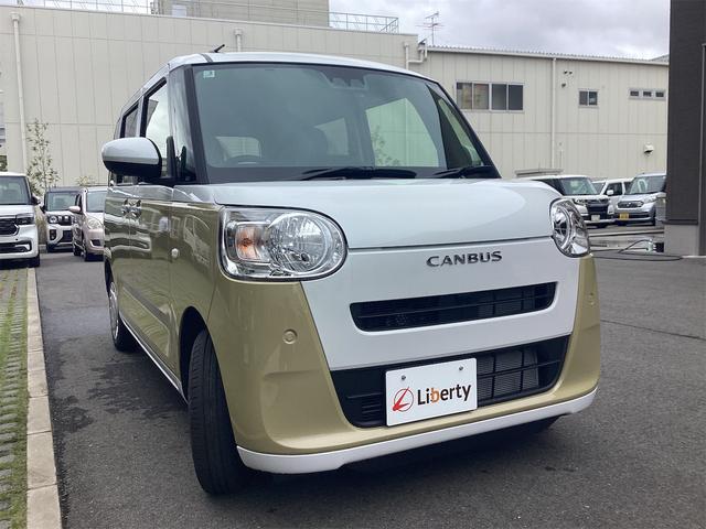 ムーヴキャンバス ストライプスＸ　バックカメラ　両側電動スライドドア　クリアランスソナー　衝突被害軽減システム　オートライト　スマートキー　アイドリングストップ　電動格納ミラー　ベンチシート　ＣＶＴ　ＥＳＣ　エアコン（3枚目）