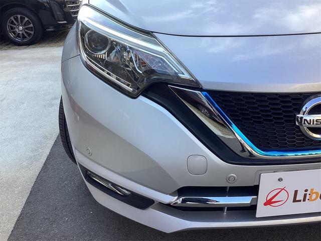 ノート e-パワー メダリスト 衝突軽減B 純正ナビ TV アラウンドビューモニター ETC クルーズコントロール 革巻きステアリング スマートキー プッシュスタート ステアリングスイッチ オートライト 純正アルミホイール(24枚目)