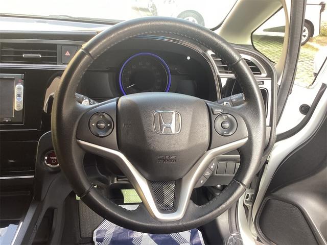 シャトル ハイブリッドZ 安心パッケージ 純正ナビ TV Bカメラ ETC LEDヘッドライト クルーズコントロール パドルシフト 革巻きステアリング スマートキー プッシュスタート 純正アルミホイール 電動格納ミラー(6枚目)