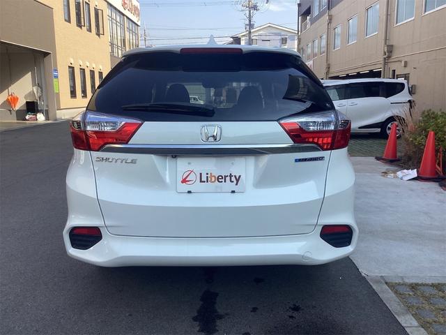 シャトル ハイブリッドZ 安心パッケージ 純正ナビ TV Bカメラ ETC LEDヘッドライト クルーズコントロール パドルシフト 革巻きステアリング スマートキー プッシュスタート 純正アルミホイール 電動格納ミラー(19枚目)