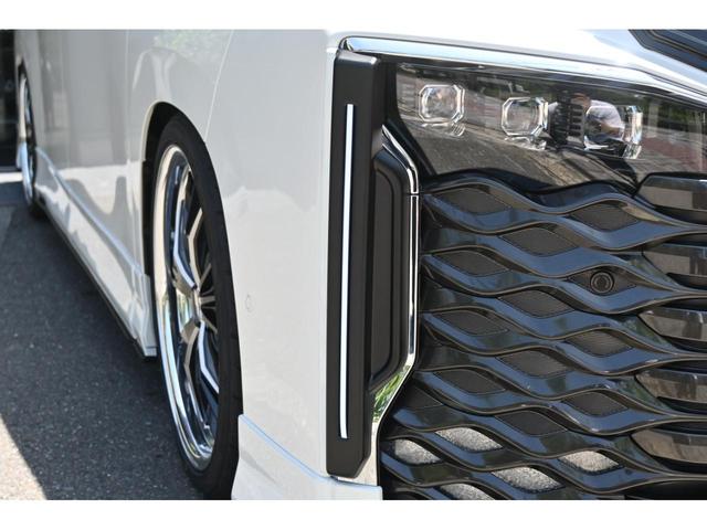 ヴォクシー Ｓ－Ｚ　ＺＥＵＳ新車カスタム　エアロ（Ｆ・Ｓ・Ｒ・ＧＧ・ＲＧ・ＤＬＧ）・エアロ塗装・車高調・４本出しマフラー・２０インチ・ドアミラーカバー・カーボン調ピラーパネル・１０．５型ＤＡ・ＴＴＭ・ＬＥＤヘッドランプ（12枚目）