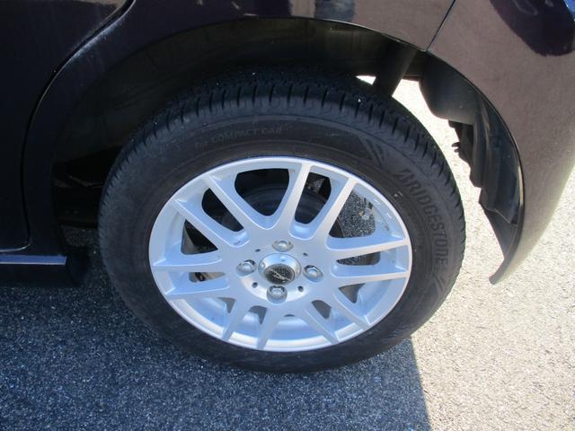 ワゴンＲ ２０周年記念車　ＥＴＣ　ナビ　衝突被害軽減システム　オートライト　ＨＩＤ　スマートキー　アイドリングストップ　電動格納ミラー　シートヒーター　ベンチシート　ＣＶＴ　盗難防止システム　ＡＢＳ　ＥＳＣ　ＣＤ　ＤＶＤ再生（23枚目）