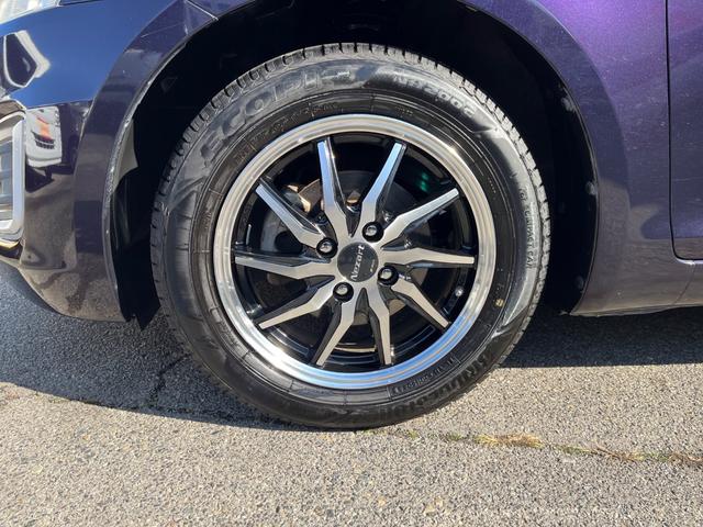 スイフト XG ユーザー様買取車両 社外ナビ 社外15AW ETC スマートキー プッシュスタート 電格ミラー セキュリティアラーム ヘッドライトレベライザー リアスポイラー(50枚目)