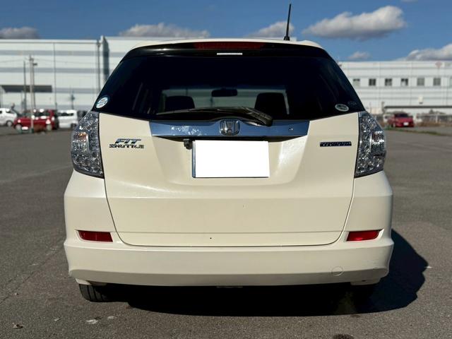 フィットシャトルハイブリッド ハイブリッド・スマートセレクション ユーザー様買取車 ナビ VSA ABS+TCS+横すべり抑制 HID アイドリングストップ 衝突安全ボディ 盗難防止システム スマートキー ECONモード オートクルーズコントロール オートエアコン(11枚目)
