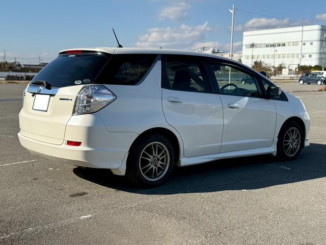 フィットシャトルハイブリッド ハイブリッド・スマートセレクション ユーザー様買取車 ナビ VSA ABS+TCS+横すべり抑制 HID アイドリングストップ 衝突安全ボディ 盗難防止システム スマートキー ECONモード オートクルーズコントロール オートエアコン(13枚目)