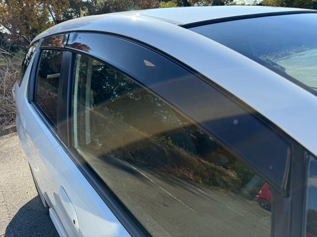 フィットシャトルハイブリッド ハイブリッド・スマートセレクション ユーザー様買取車 ナビ VSA ABS+TCS+横すべり抑制 HID アイドリングストップ 衝突安全ボディ 盗難防止システム スマートキー ECONモード オートクルーズコントロール オートエアコン(56枚目)