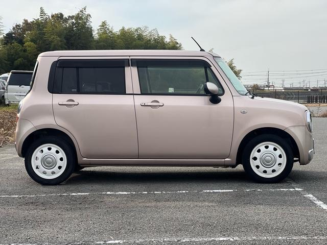 アルトラパンショコラ Ｇ　ユーザー様買取車　Ｂｌｕｅｔｏｏｔｈオーディオ　ＴＶ　ナビ　スマートキー　プッシュスタート　エアコン　アイドリングストップ　ドアバイザー　ＥＴＣ　ＨＩＤ　衝突安全ボディ　盗難防止システム　エアバック（9枚目）