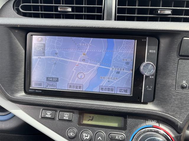 アクア Ｓ　ＥＴＣ　バックカメラ　ナビ　ＴＶ　アルミホイール　オートライト　スマートキー　アイドリングストップ　電動格納ミラー　ＣＶＴ　衝突安全ボディ　記録簿　ＡＢＳ　ＥＳＣ　ＣＤ　ＤＶＤ再生　Ｂｌｕｅｔｏｏｔｈ（5枚目）