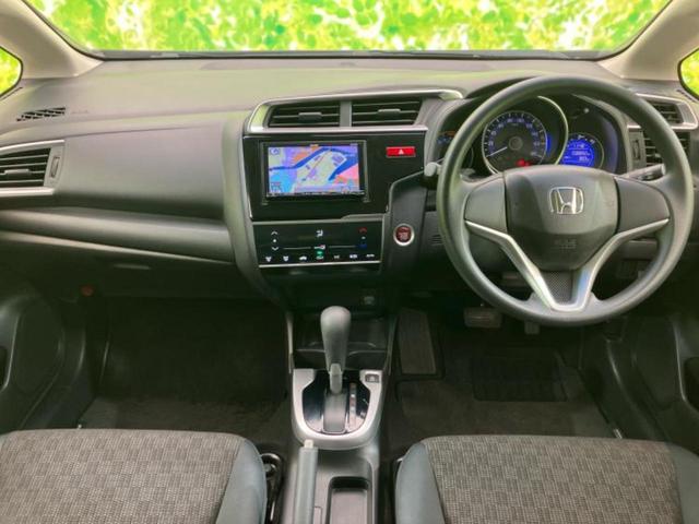 フィット 13G・Fパッケージ 保証書/社外 SDナビ/シティーブレーキアクティブシステム(ホンダ)/Bluetooth接続/ETC/EBD付ABS/横滑り防止装置/アイドリングストップ/フルセグTV/DVD/禁煙車 ワンオーナー(4枚目)