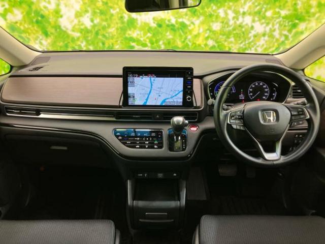 オデッセイハイブリッド ｅＨＥＶアブソルート・ＥＸ　保証書／純正　１０インチ　ＳＤナビ／ホンダセンシング／両側電動スライドドア／シートヒーター　前席／マルチビューカメラシステム／車線逸脱防止支援システム／シート　ハーフレザー／電動バックドア　電動シート（4枚目）