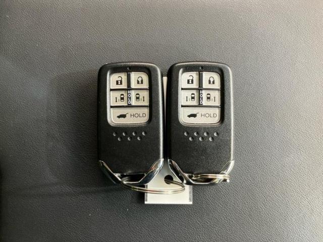 オデッセイハイブリッド ｅＨＥＶアブソルート・ＥＸ　保証書／純正　１０インチ　ＳＤナビ／ホンダセンシング／両側電動スライドドア／シートヒーター　前席／マルチビューカメラシステム／車線逸脱防止支援システム／シート　ハーフレザー／電動バックドア　電動シート（49枚目）