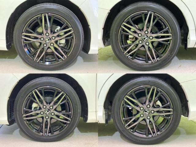 オデッセイハイブリッド ｅＨＥＶアブソルート・ＥＸ　保証書／純正　１０インチ　ＳＤナビ／ホンダセンシング／両側電動スライドドア／シートヒーター　前席／マルチビューカメラシステム／車線逸脱防止支援システム／シート　ハーフレザー／電動バックドア　電動シート（63枚目）