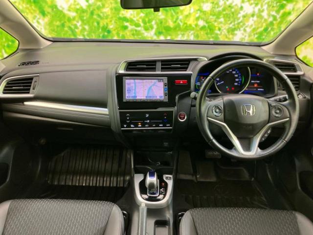 フィットハイブリッド ハイブリッド・Ｌパッケージ　新品タイヤ／保証書／純正　ＳＤナビ／シート　ハーフレザー／ヘッドランプ　ＬＥＤ／Ｂｌｕｅｔｏｏｔｈ接続／ＥＢＤ付ＡＢＳ／横滑り防止装置／アイドリングストップ／バックモニター／フルセグＴＶ／ＤＶＤ（4枚目）