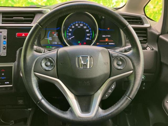 フィットハイブリッド ハイブリッド・Ｌパッケージ　新品タイヤ／保証書／純正　ＳＤナビ／シート　ハーフレザー／ヘッドランプ　ＬＥＤ／Ｂｌｕｅｔｏｏｔｈ接続／ＥＢＤ付ＡＢＳ／横滑り防止装置／アイドリングストップ／バックモニター／フルセグＴＶ／ＤＶＤ（15枚目）