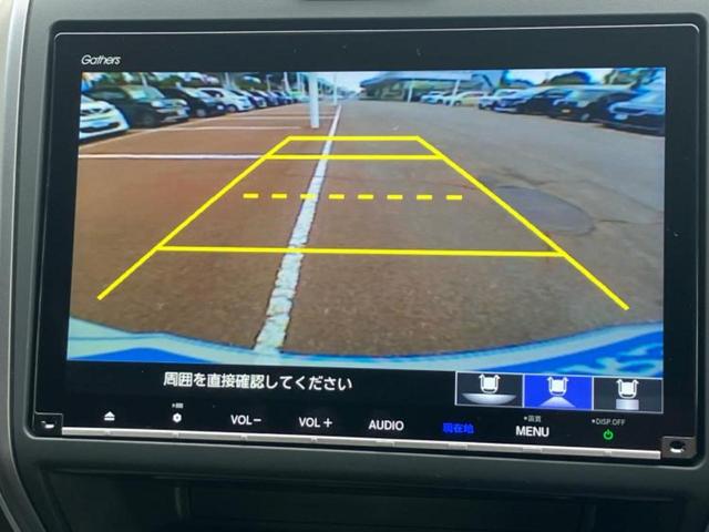 フリードハイブリッド ハイブリッドGホンダセンシング 純正 9インチ ナビ/フリップダウンモニター 純正 9インチ/衝突安全装置/両側電動スライドドア/シートヒーター 前席/車線逸脱防止支援システム/ヘッドランプ LED/ETC/EBD付ABS(12枚目)