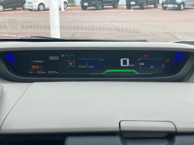 フリードハイブリッド ハイブリッドGホンダセンシング 純正 9インチ ナビ/フリップダウンモニター 純正 9インチ/衝突安全装置/両側電動スライドドア/シートヒーター 前席/車線逸脱防止支援システム/ヘッドランプ LED/ETC/EBD付ABS(14枚目)