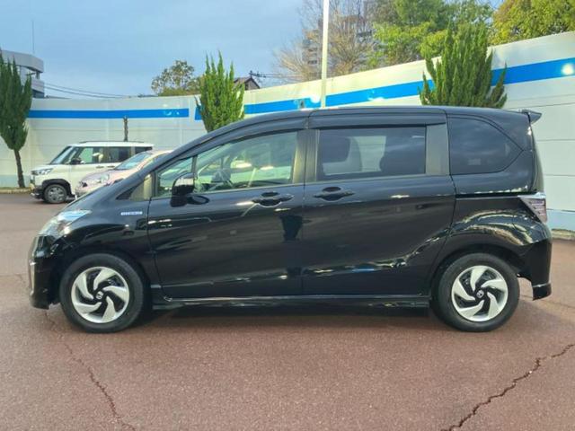 フリードハイブリッド ハイブリッドジャストセレクション　純正　ＳＤナビ／両側電動スライドドア／ヘッドランプ　ＨＩＤ／Ｂｌｕｅｔｏｏｔｈ接続／ＥＴＣ／ＥＢＤ付ＡＢＳ／横滑り防止装置／アイドリングストップ／クルーズコントロール／バックモニター／ワンセグＴＶ（2枚目）