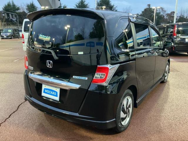 フリードハイブリッド ハイブリッドジャストセレクション　純正　ＳＤナビ／両側電動スライドドア／ヘッドランプ　ＨＩＤ／Ｂｌｕｅｔｏｏｔｈ接続／ＥＴＣ／ＥＢＤ付ＡＢＳ／横滑り防止装置／アイドリングストップ／クルーズコントロール／バックモニター／ワンセグＴＶ（3枚目）