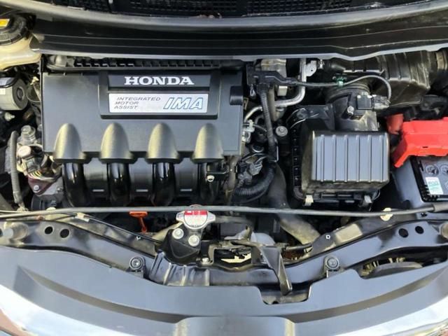 フリードハイブリッド ハイブリッドジャストセレクション　純正　ＳＤナビ／両側電動スライドドア／ヘッドランプ　ＨＩＤ／Ｂｌｕｅｔｏｏｔｈ接続／ＥＴＣ／ＥＢＤ付ＡＢＳ／横滑り防止装置／アイドリングストップ／クルーズコントロール／バックモニター／ワンセグＴＶ（52枚目）