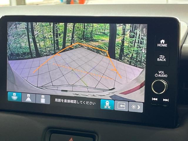 ヴェゼル ｅ：ＨＥＶ　Ｚ　登録済未使用車　メーカー９型ナビ　バックカメラ　衝突被害軽減　レーダークルーズ　電動リアゲート　ハーフレザーシート　コーナーセンサー　スマートキー　ＬＥＤヘッド　ＥＴＣ２．０　オートハイビーム（4枚目）