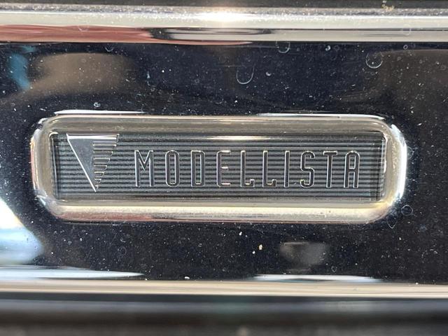 ヴォクシー ハイブリッドＶ　モデリスタエアロ　両側電動ドア　純正９型ナビ　後席モニター　バックカメラ　禁煙車　スマートキー　ＬＥＤヘッド　ビルトインＥＴＣ　クルーズコントロール　オートライト　デュアルエアコン（3枚目）