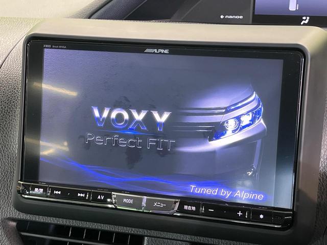ヴォクシー ハイブリッドＶ　モデリスタエアロ　両側電動ドア　純正９型ナビ　後席モニター　バックカメラ　禁煙車　スマートキー　ＬＥＤヘッド　ビルトインＥＴＣ　クルーズコントロール　オートライト　デュアルエアコン（5枚目）