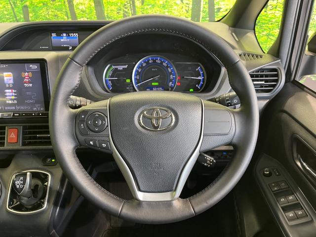 ヴォクシー ハイブリッドＶ　モデリスタエアロ　両側電動ドア　純正９型ナビ　後席モニター　バックカメラ　禁煙車　スマートキー　ＬＥＤヘッド　ビルトインＥＴＣ　クルーズコントロール　オートライト　デュアルエアコン（12枚目）