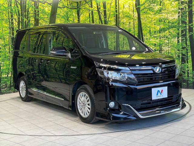 ヴォクシー ハイブリッドＶ　モデリスタエアロ　両側電動ドア　純正９型ナビ　後席モニター　バックカメラ　禁煙車　スマートキー　ＬＥＤヘッド　ビルトインＥＴＣ　クルーズコントロール　オートライト　デュアルエアコン（17枚目）