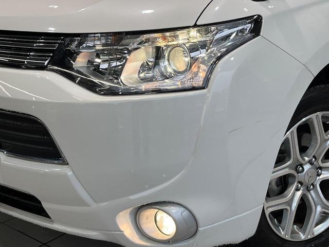 アウトランダーPHEV Gセーフティパッケージ 4WD SDナビ バックカメラ 衝突被害軽減システム レーダークルーズ 禁煙車 ドラレコ スマートキー HIDヘッド ETC オートライト デュアルエアコン 純正18インチアルミ Bluetooth(12枚目)