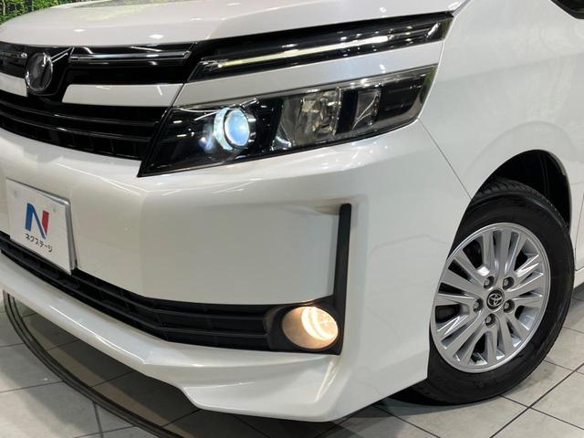 ヴォクシー V 両側電動ドア 後席モニター 9インチナビ バックカメラ 衝突被害軽減システム 禁煙車 ドラレコ スマートキー LEDヘッド ビルトインETC クルコン 純正15インチアルミ オートハイビーム(11枚目)